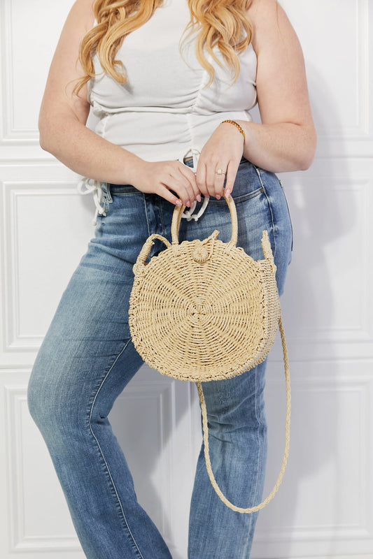 Cute round beige straw handbag